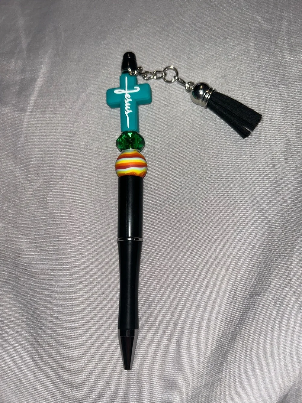 Decorative Black Ballpoint Pen with Teal Cross Charm and Tassel